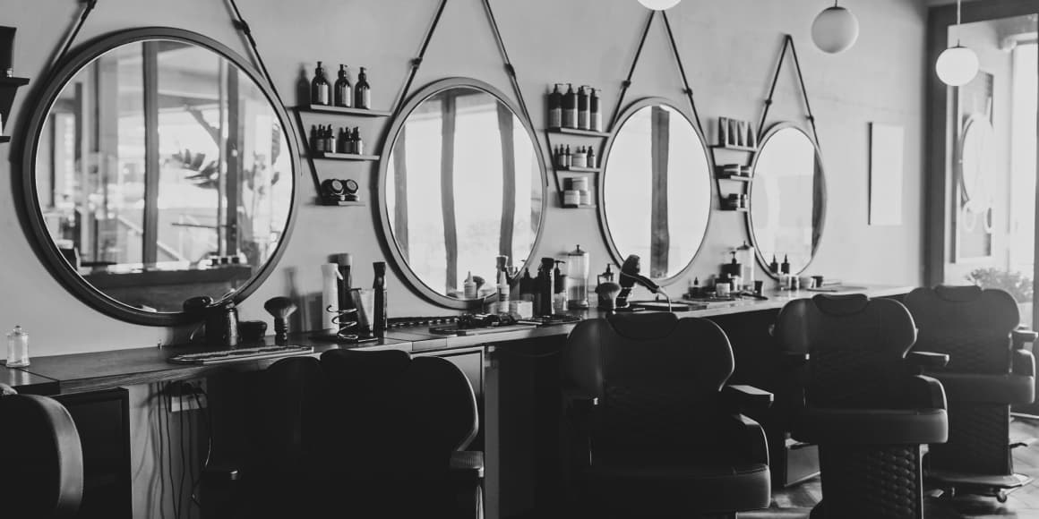 barbershop with chairs and mirrors